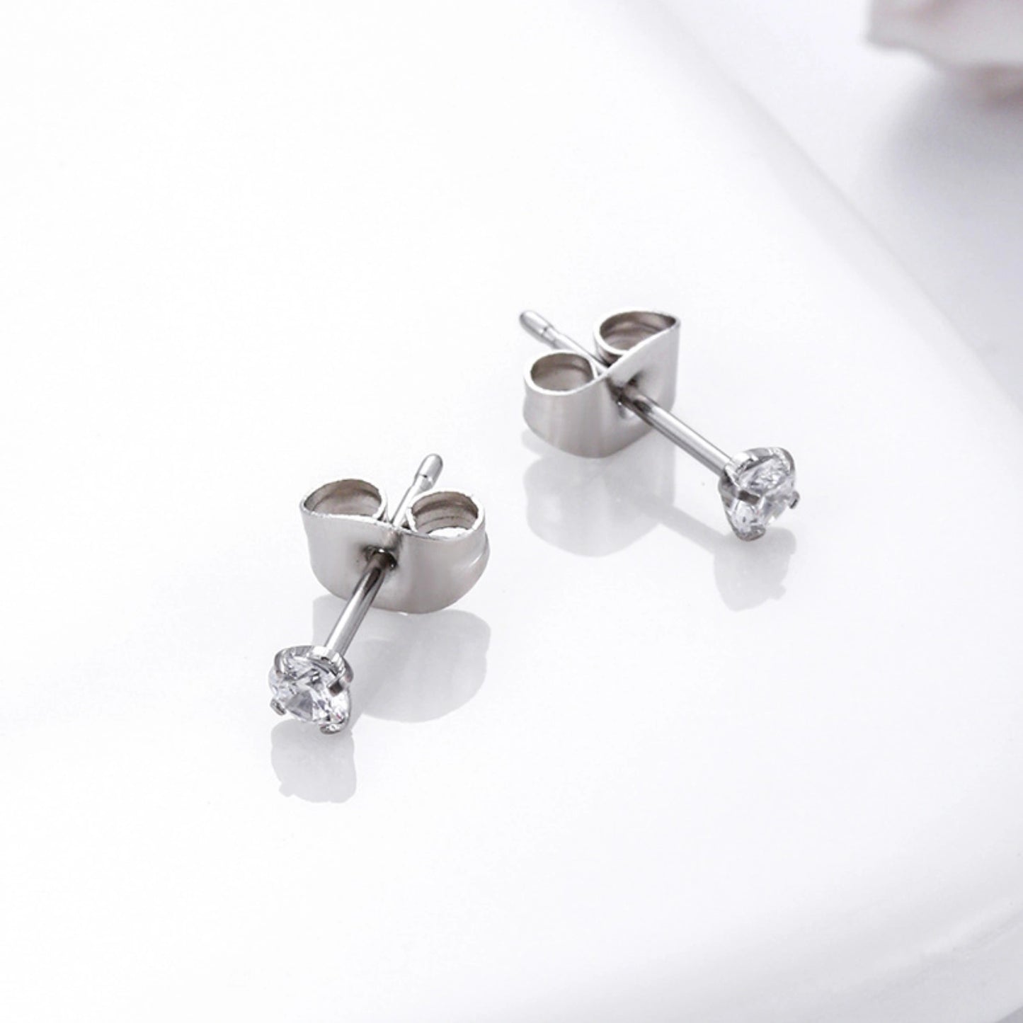 Brinco Ponto de Luz em Aço Cirúrgico 316L com Zircônia