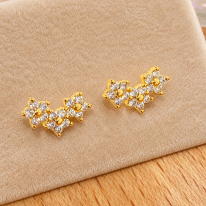 Piercing Labret Trio de Flores dourado em Titânio G23