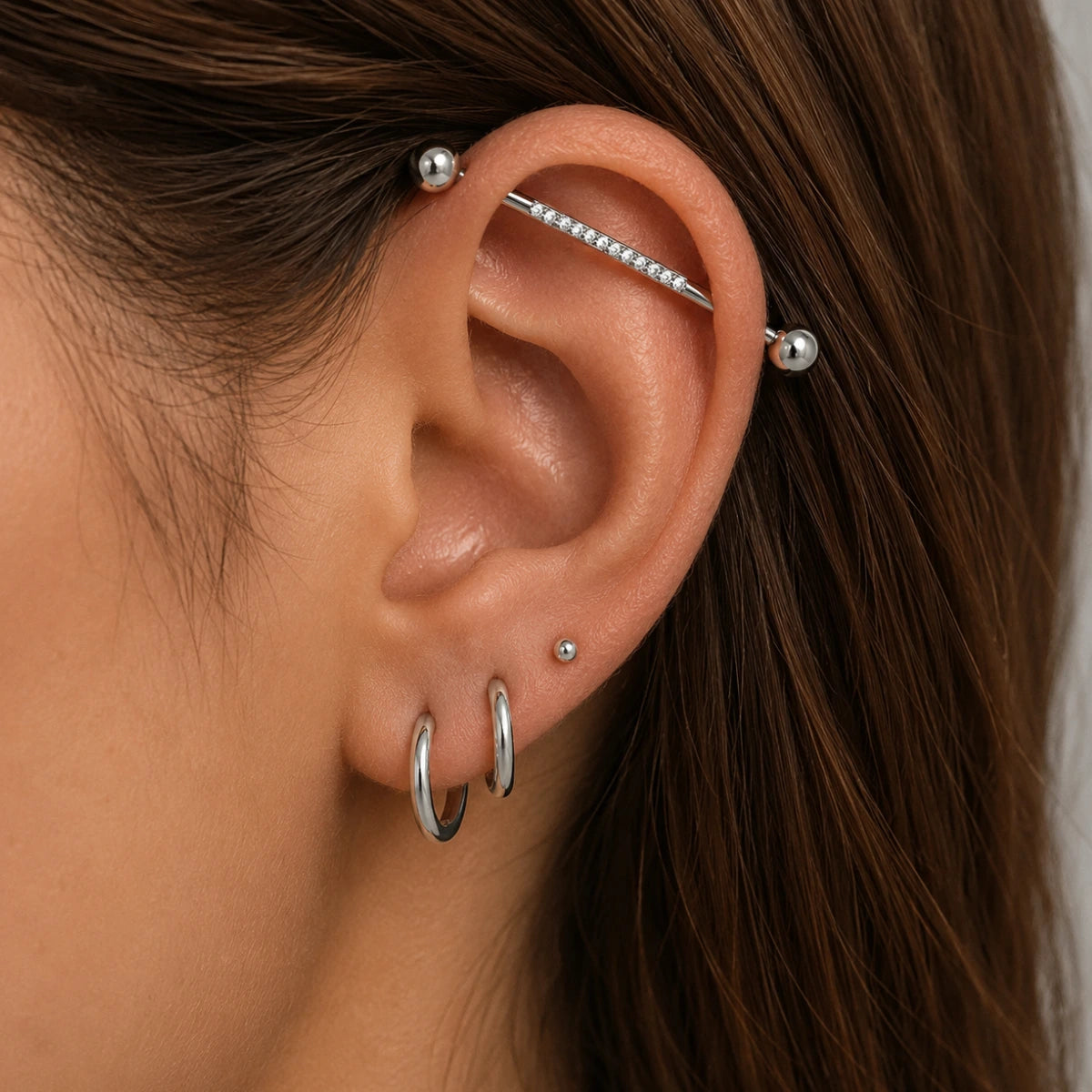 Piercing Transversal de Titânio G23 com Zircônia no Centro